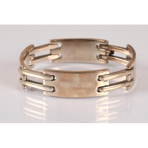 123 - Silver bracelet inscribed 'Gucci', hallmarked GI (Gucci Timepieces) London, 60g