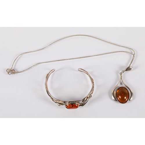 113 - Silver bangle and necklace set with amber cabochons, gross weight 22g