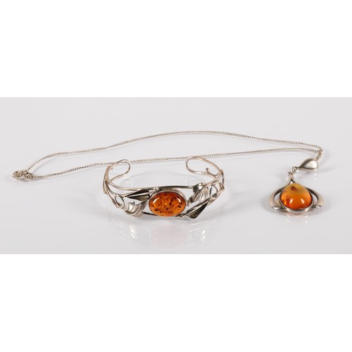 113 - Silver bangle and necklace set with amber cabochons, gross weight 22g