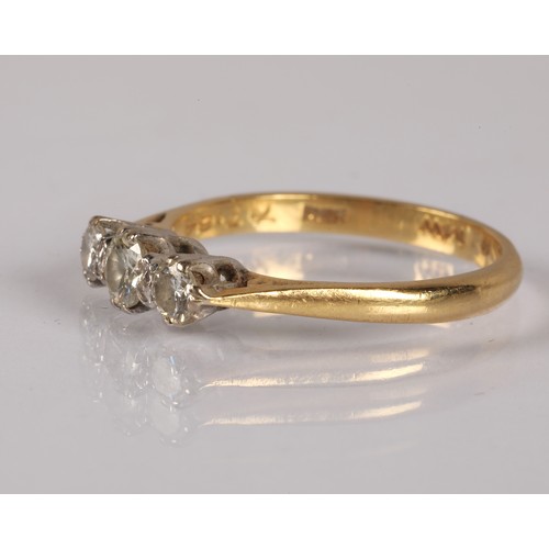 120 - 18ct gold ring set with a trio of diamonds, ring size M, 2.6g