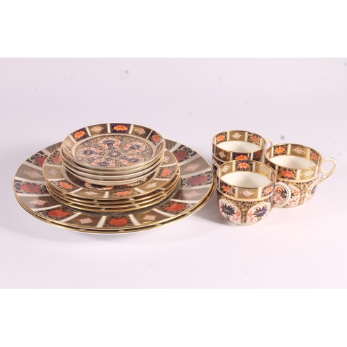 416 - Three Royal Crown Derby Imari 1128 pattern porcelain trios, of coffee cups, saucers and side plates,... 