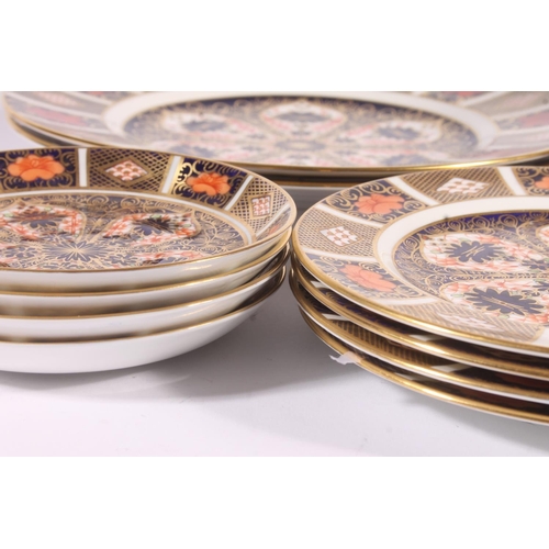416 - Three Royal Crown Derby Imari 1128 pattern porcelain trios, of coffee cups, saucers and side plates,... 