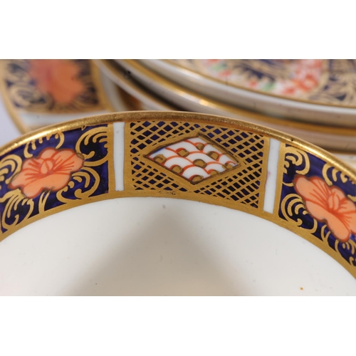 416 - Three Royal Crown Derby Imari 1128 pattern porcelain trios, of coffee cups, saucers and side plates,... 
