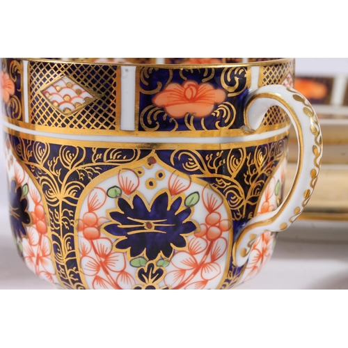 416 - Three Royal Crown Derby Imari 1128 pattern porcelain trios, of coffee cups, saucers and side plates,... 