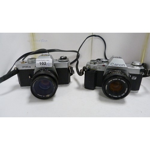 102 - Canon AL-1 camera with Canon lens, and a Yashica FR2 camera with Yashica lens.  (2)