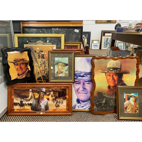 345 - Assortment of John Wayne framed prints and wall clock (13)