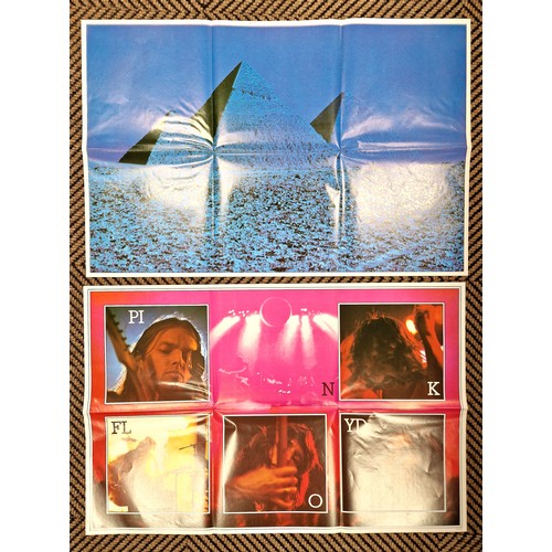 197 - Three Pink Floyd vinyl records, to include The Wall with sticker, Meddle, and Dark Side of the Moon ... 