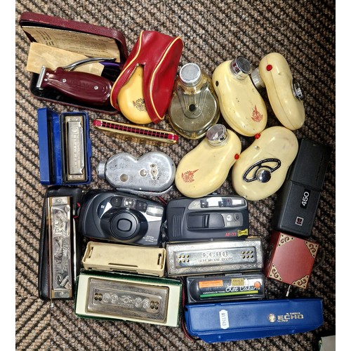 363 - Vintage 35mm cameras, harmonicas, music box, vintage razors, etc.