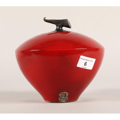 6 - Tim Andrews red raku bulbous jar and cover. approx. 17cm to tip of lid