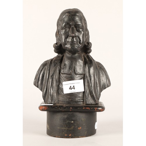 44 - 19th century cast metal door stop in the form of the Methodist founder John Wesley.