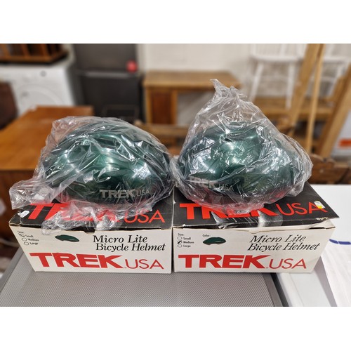 705 - Two Trek USA Micro Lite bicycle helmets, both green in sizes S and M