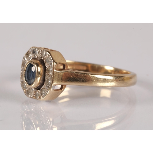 50 - 9ct gold ring set with a central topaz blue stone surrounded by diamonds, ring size K, 2.1g