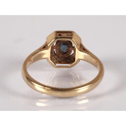 50 - 9ct gold ring set with a central topaz blue stone surrounded by diamonds, ring size K, 2.1g