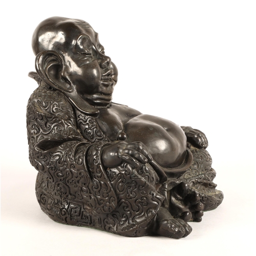 246 - Bronzed resin buddha. 23cm