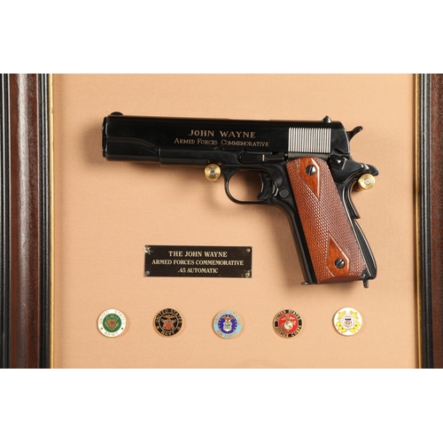 341 - Commemorative John Wayne Armed Forces replica pistol and framed print