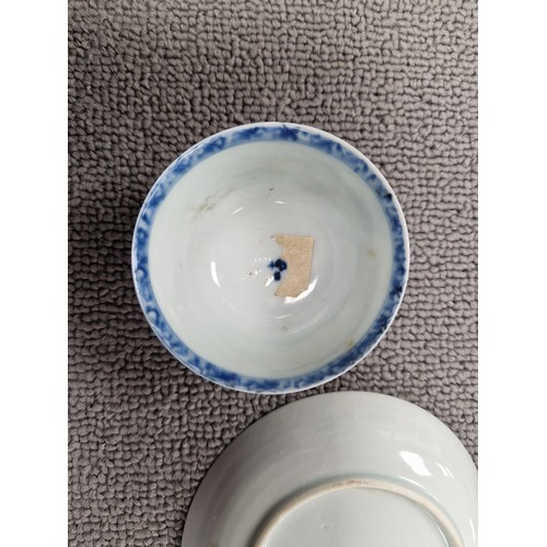 233 - Nanking Cargo, blue and white tea bowl and saucer, Christie's stickers to base