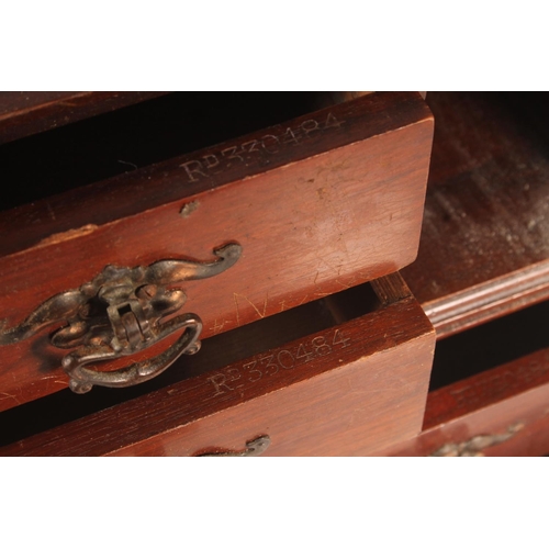 11 - Late 19th century four drawer cabinet with arched top compartments, 36cm high.