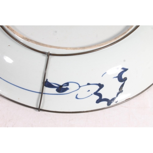 24 - Chinese porcelain charger decorated in blue foliate pattern, 35cm.