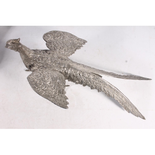 28 - Pair of polished pewter pheasant models, 38cm long.