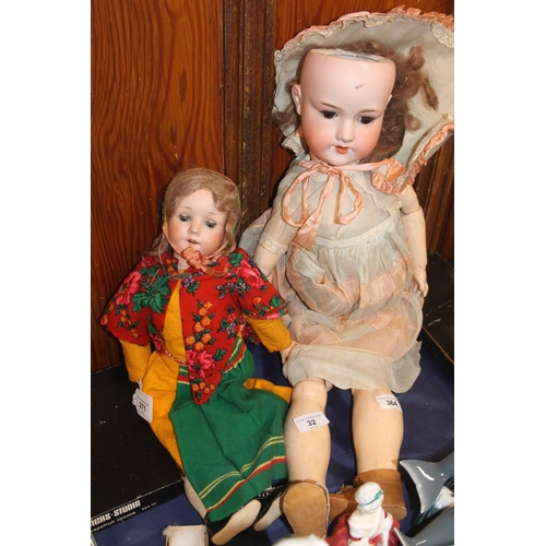 32 - Armand Marseilles German bisque doll, max 65cm high and another doll.