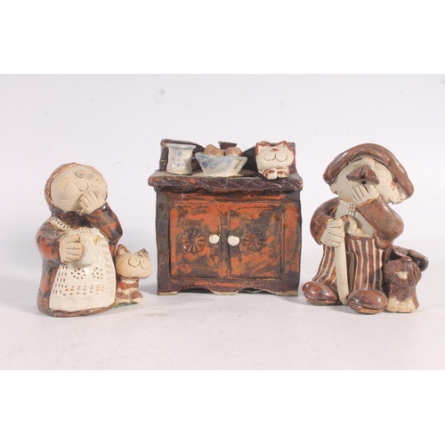 40 - Novelty stoneware pottery models and a pottery money bank.