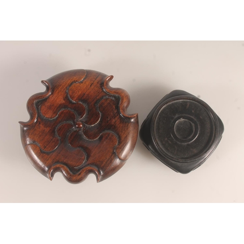 53 - Chinese carved wood lotus decorated stand and another Chinese wooden stand.