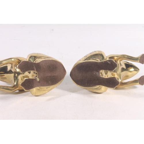 6 - Pair of brass frog bookends, 15cm high.