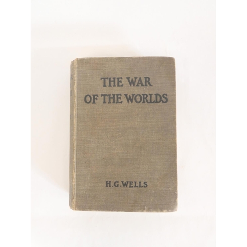 22 - WELLS H. G.  The War of the Worlds. Signed by the author to the half title. 16pp publ... 