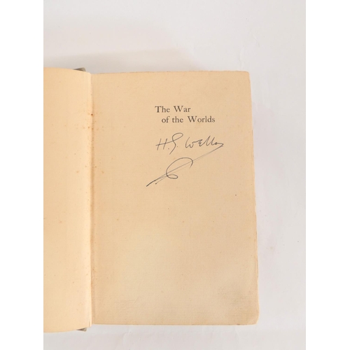 22 - WELLS H. G.  The War of the Worlds. Signed by the author to the half title. 16pp publ... 