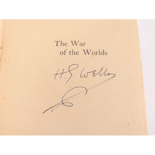 22 - WELLS H. G.  The War of the Worlds. Signed by the author to the half title. 16pp publ... 