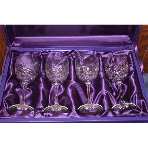 15 - Edinburgh Crystal wine glasses, some boxed, and Edinburgh Crystal candleholders.