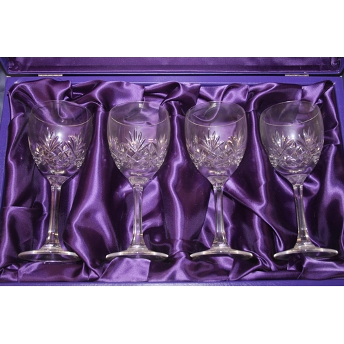 15 - Edinburgh Crystal wine glasses, some boxed, and Edinburgh Crystal candleholders.