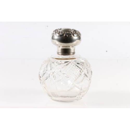 517 - Early 20th century silver topped cut glass perfume bottle, the collar with hallmarks for Chester 191... 