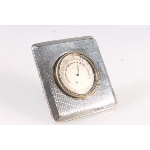 518 - Art Deco silver easel backed table barometer with engine turned decoration by Arthur Barnett & C... 