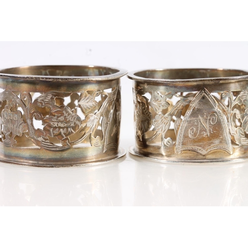 519 - A pair of silver napkin rings by K Bros, Birmingham 1909 and another pair of silver napkin rings, 71... 