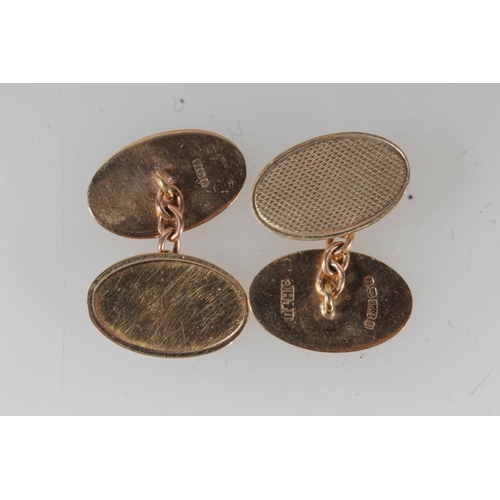 530 - Pair of 9ct gold oval cuff links, makers mark 'T&HC', 4.5g.