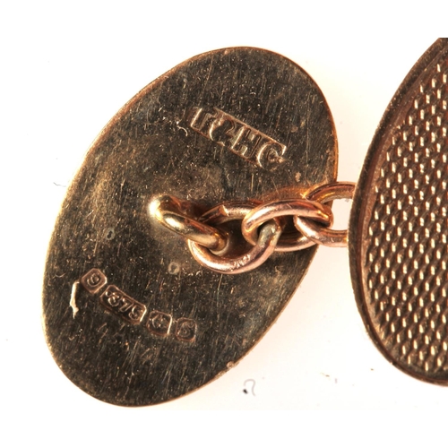 530 - Pair of 9ct gold oval cuff links, makers mark 'T&HC', 4.5g.