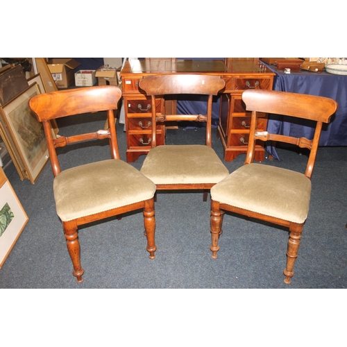 765 - Pair of Victorian mahogany dining chairs and another similar.