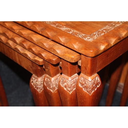 764 - Carved hardwood quartetto nest of tables.