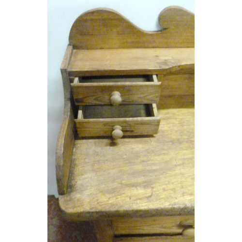 529 - Victorian scumbled pine dresser, the shaped gallery with short drawers above further short drawers a... 