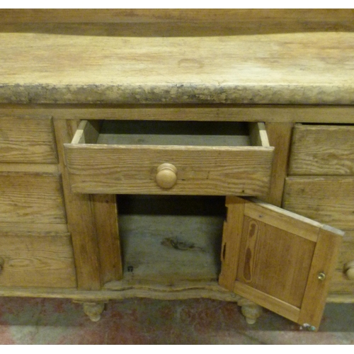 529 - Victorian scumbled pine dresser, the shaped gallery with short drawers above further short drawers a... 