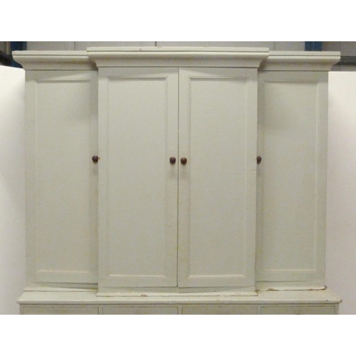 530 - Victorian painted pine breakfront housekeeper's cupboard, with four large doors to the top section e... 
