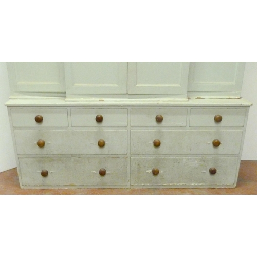 530 - Victorian painted pine breakfront housekeeper's cupboard, with four large doors to the top section e... 