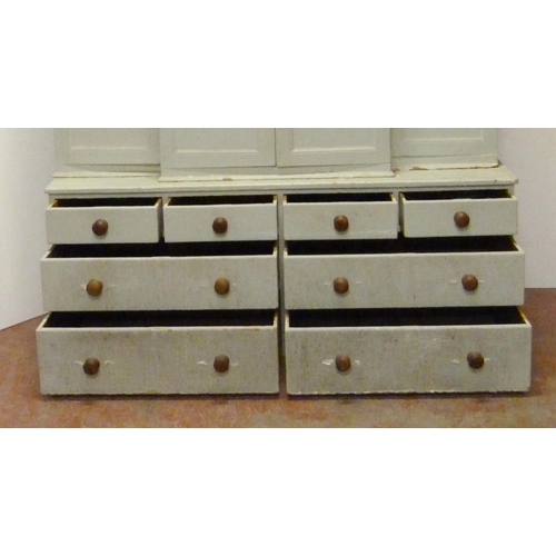 530 - Victorian painted pine breakfront housekeeper's cupboard, with four large doors to the top section e... 