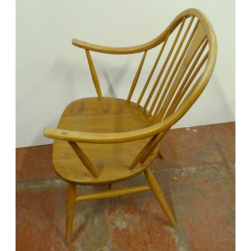 531 - Pair of Ercol elm and beech 'Cowhorn' chairs, 85cm high, and a pair of Ercol 'Quaker' chairs, c. 196... 