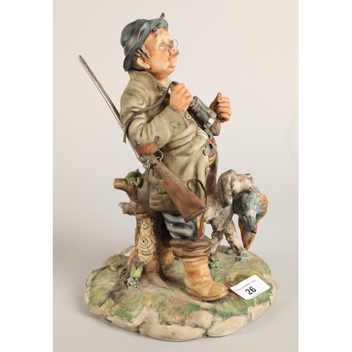 26 - Capodimonte figure of a gamekeeper with a dog 