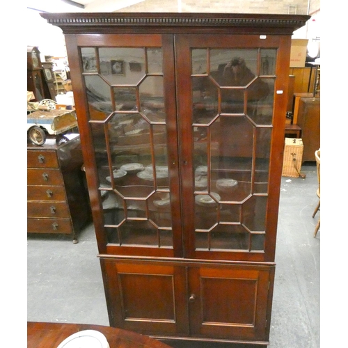 398 - Edwardian astragal glazed cabinet with pair of panel doors below.