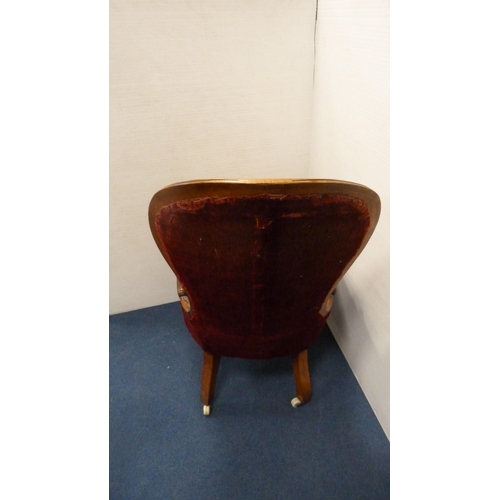 417 - Victorian walnut lady's spoon-back chair, with serpentine front, on ceramic castors.