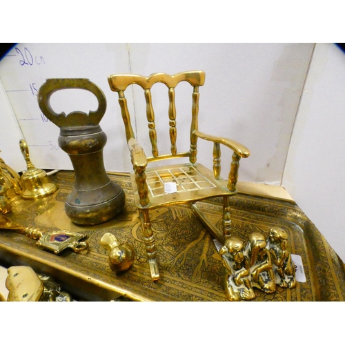 43 - Brassware to include magazine rack, Indian brass tray, ornaments, butcher's weight, pair of spiral c... 