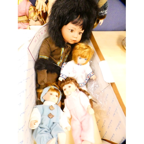 49 - Group of dolls to include a boxed Regency Fine Arts 'Pride and Joy' doll, another near-matching doll... 